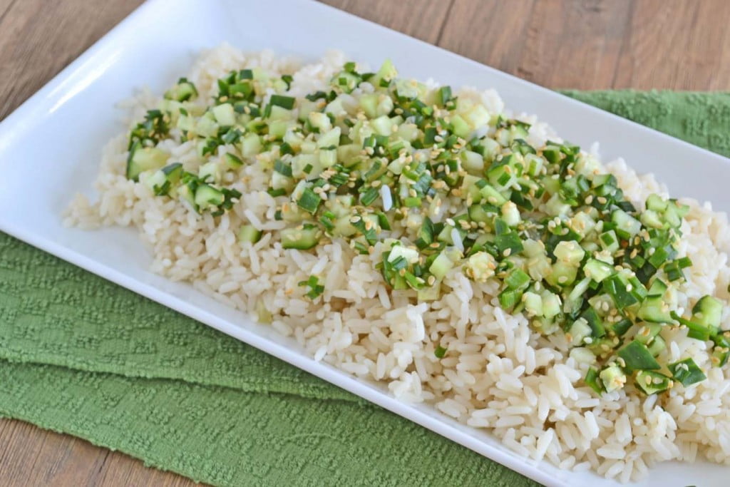 warm sesame rice salad with cold cucumber, chive, and lime
