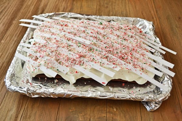 Cake sprinkled with candy cane bits.