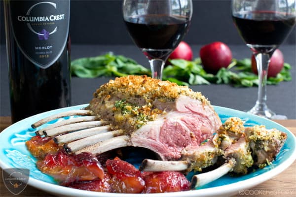 Rack of Lamb with Mint and Basil Pesto Crust served with Roasted Plums