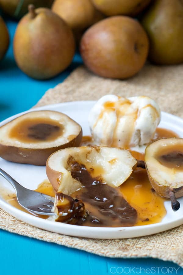 Grilled Pears with chocolate and caramel filling spilling out.