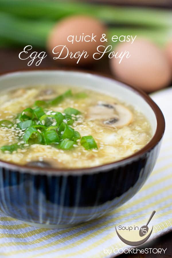 Egg Drop Soup topped with green onion and sesame seeds.