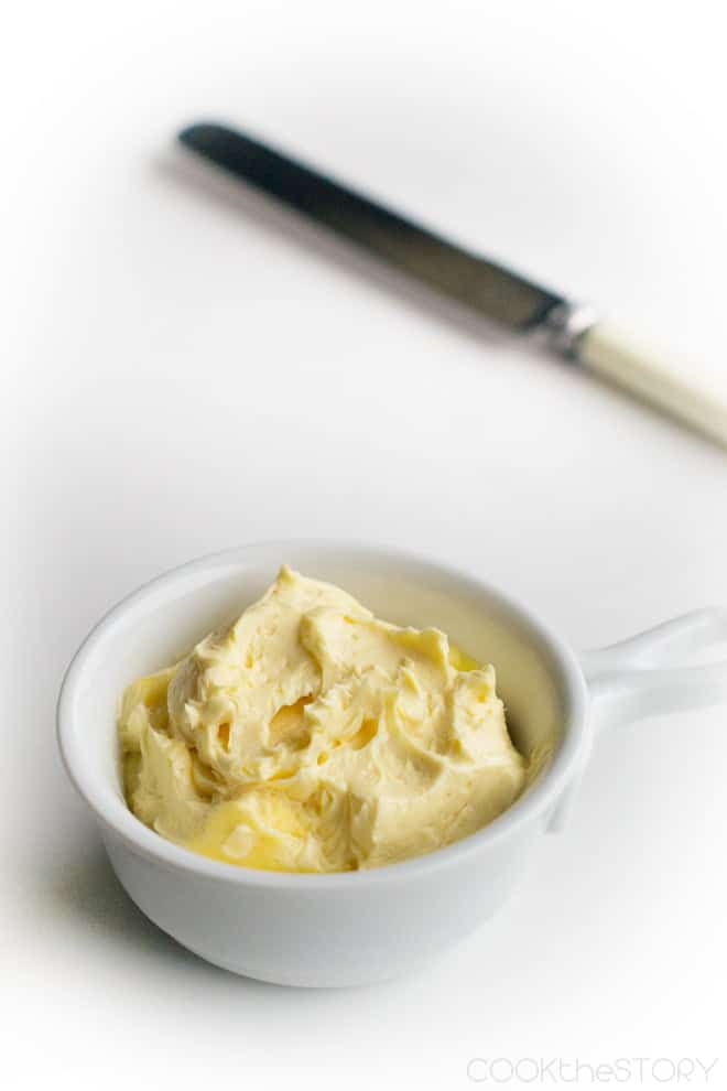 Hollandaise butter in a small white dish.