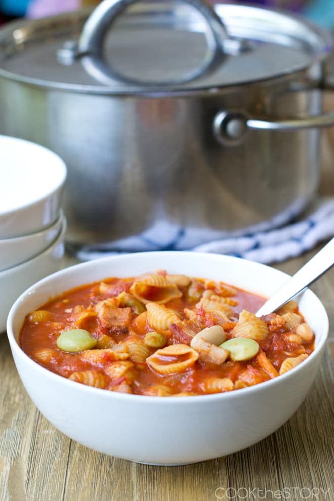 Pasta e Fagioli Soup in a white bowl with spoon.