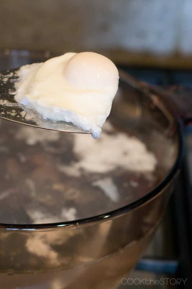 Scoop out poached eggs with a slotted spoon or slotted spatula