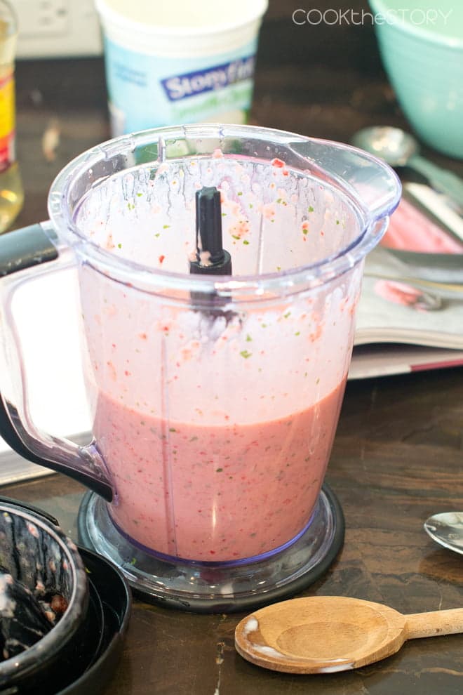 Strawberry Yogurt ingredients blended up in a blender.