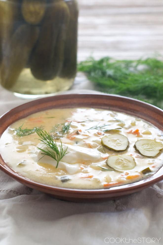 Dill Pickle Soup topped with Greek yogurt and fresh dill.